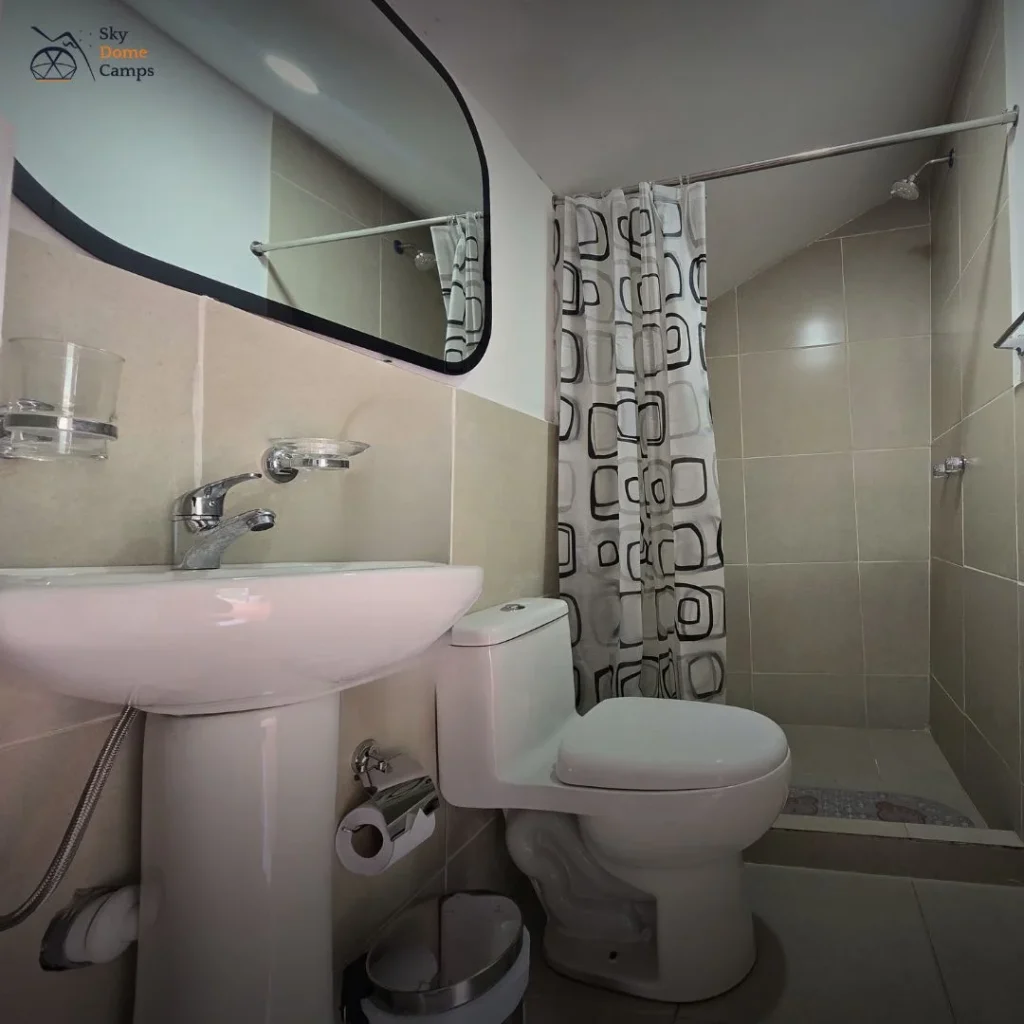 Private bathroom with hot shower and toilet inside Sky Dome at Soraypampa on Salkantay Trek