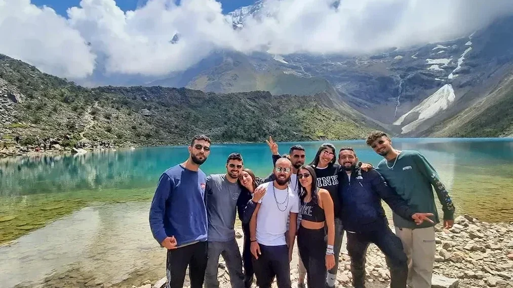 Turquoise Humantay Lake at 4200 meters on Day 1 of Salkantay Trek to Machu Picchu
